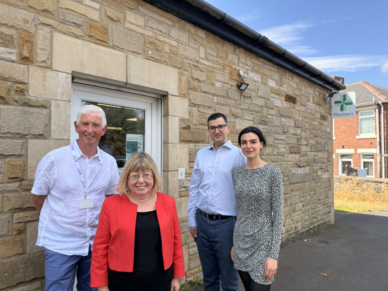 Liz Twist MP with the Burnopfield Pharmacy team outside the pharmacy